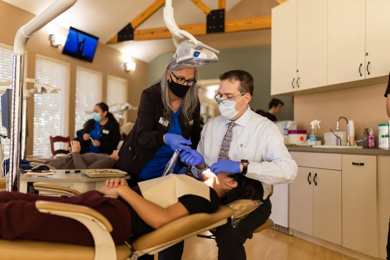 Dr. Hulme begins a multi-disciplinary treatment examination at Hulme Orthodontics in San Antonio, TX